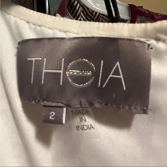 Theia Luxury Gown With Sparkling Crystal and Sequins - Picture 9 of 12